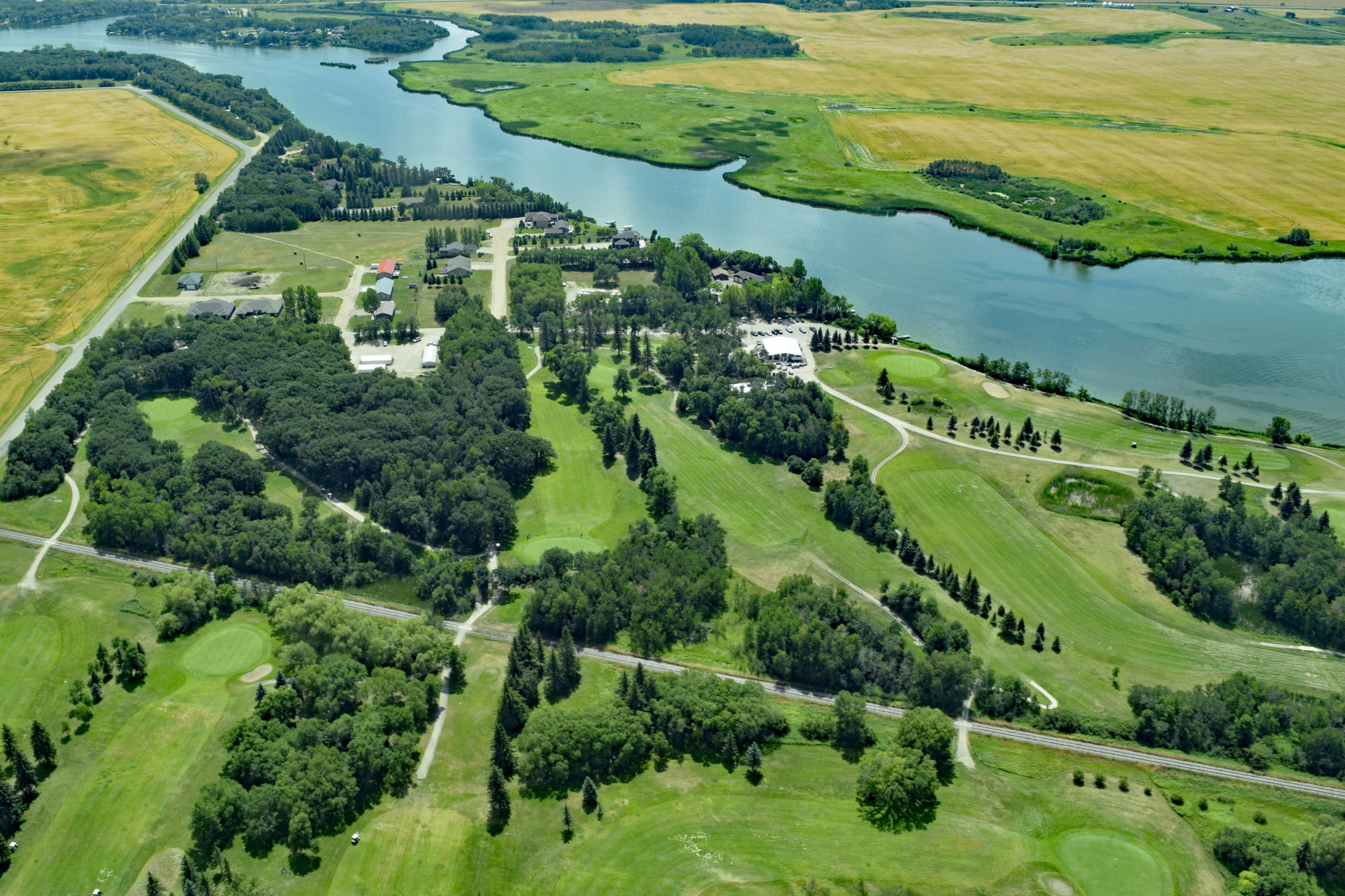 Aerial view of golf course and river